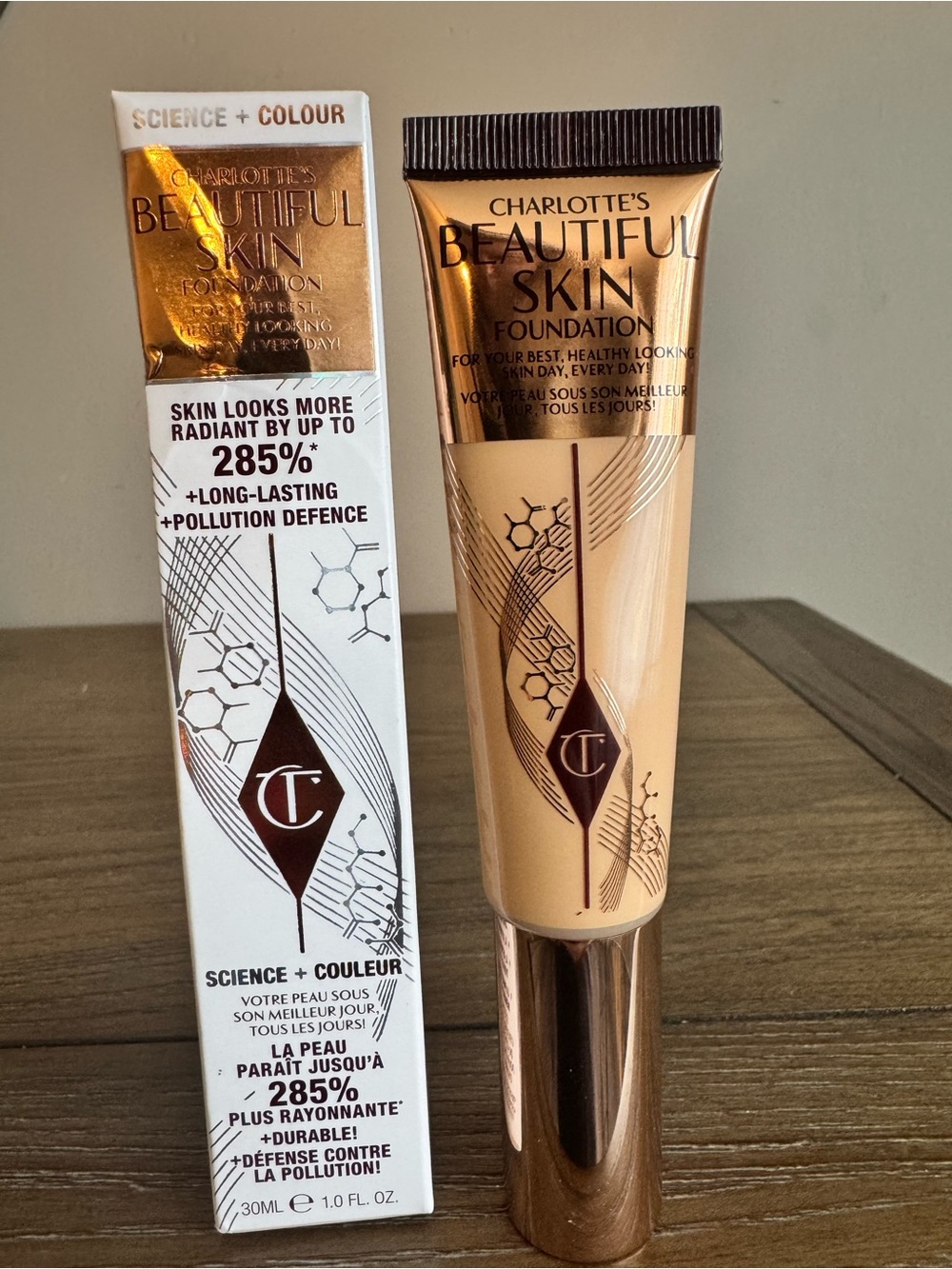 Charlotte Tilbury Beautiful Skin Foundation — Warm Beige with Rose Gold Cap 2N
